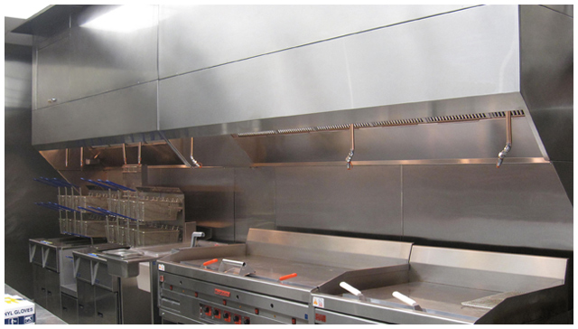 An installed BD-2 restaurant hood in a full commercial kitchen environment.